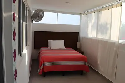 Cama o camas de una habitación en Valentina Salchi A Playas vírgenes Internet veloz