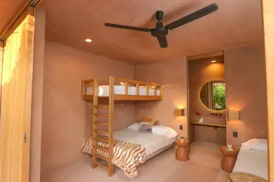 Cama o camas de una habitación en Increíble Casa frente a la playa