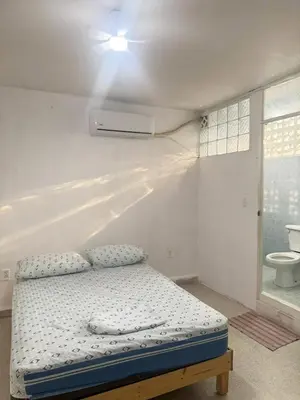 Cama o camas de una habitación en Recamaras Acuario Veracruz planta alta RESERVA whats 228ll5476O NO RESERVAS AQUI