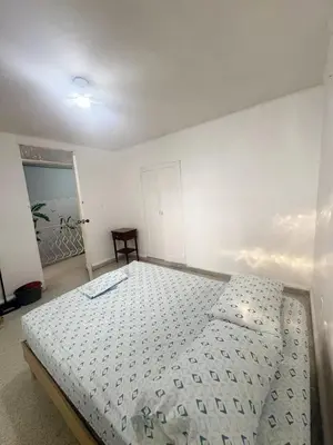 Cama o camas de una habitación en Recamaras Acuario Veracruz planta alta RESERVA whats 228ll5476O NO RESERVAS AQUI