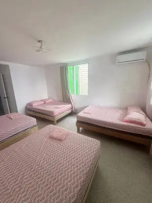 Cama o camas de una habitación en Recamaras Acuario Veracruz planta alta RESERVA whats 228ll5476O NO RESERVAS AQUI