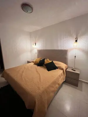 Cama o camas de una habitación en Torre Riviera el mar