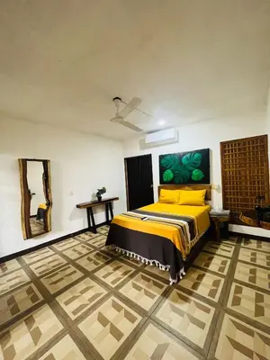 Cama o camas de una habitación en Casa Guiba 1 puerto escondido