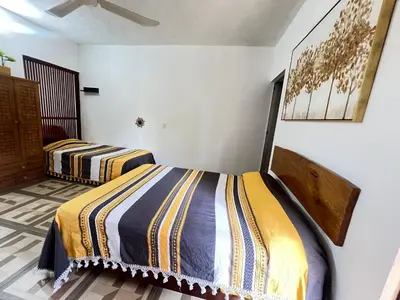 Cama o camas de una habitación en Casa Guiba 2 Puerto Escondido