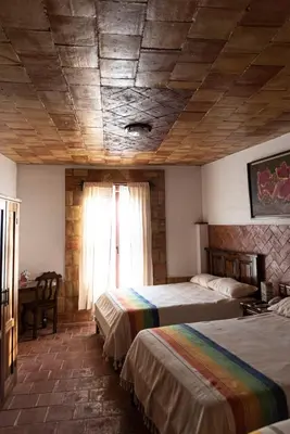 Cama o camas de una habitación en Hotel Casa Mixteca