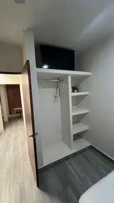Una televisión o centro de entretenimiento en Loft guelaguetza A