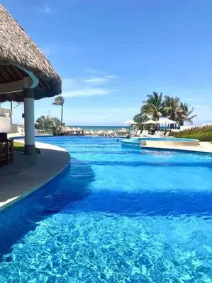 Piscina en o cerca de Hermoso Apartamento con club de playa