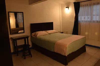 Cama o camas de una habitación en Casa Gris Alemán