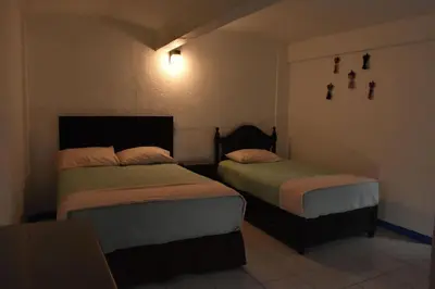 Cama o camas de una habitación en Casa Gris Alemán