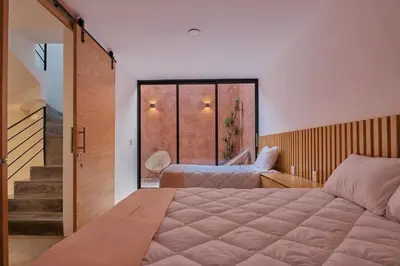 Cama o camas de una habitación en Hermosa casa ubicada en Oaxaca