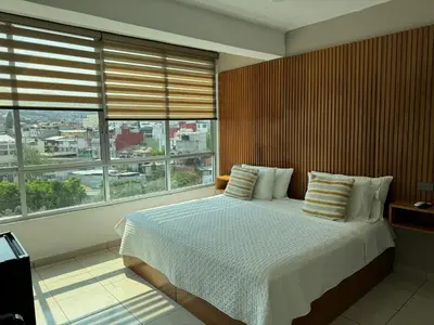 Cama o camas de una habitación en Hotel DABA