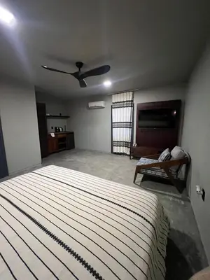Cama o camas de una habitación en Lofts Marques Oaxaca