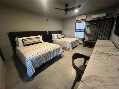 Cama o camas de una habitación en Lofts Marques Oaxaca