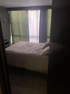Cama o camas de una habitación en Habitación con baño compartido
