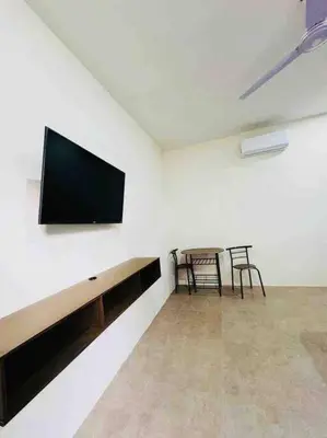 Una televisión o centro de entretenimiento en Habitación para dos personas