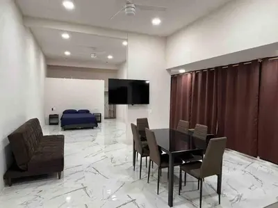 Una televisión o centro de entretenimiento en Apartamento confortable y bien ubicado