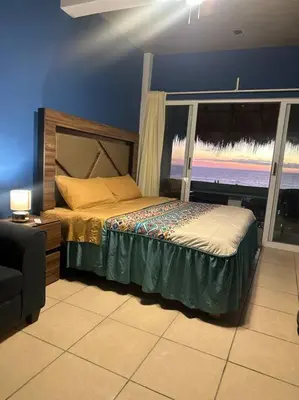 Cama o camas de una habitación en Brisa Del Mar #1