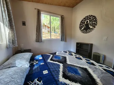 Cama o camas de una habitación en Chalet Bosque de Zacatlan II