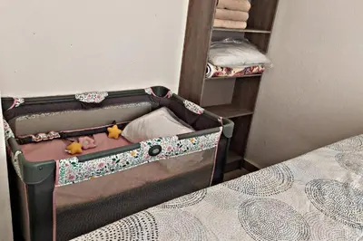 Cama o camas de una habitación en Bonito departamento planta baja en zona diamante