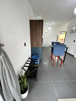 Zona de estar de Loft ËNXË Boutique Habitación Green