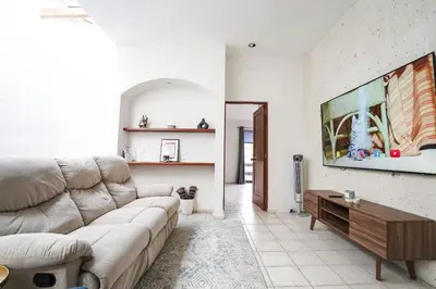 Una televisión o centro de entretenimiento en Cozy family house I Pool & Bar l Cuernavaca