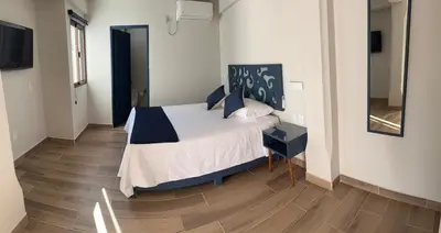 Cama o camas de una habitación en Centrico House