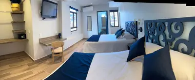 Zona de estar de Centrico House