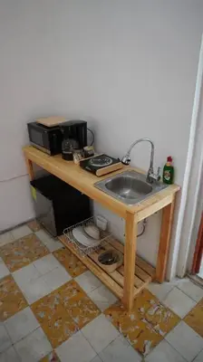 Una cocina o zona de cocina en Alberto departamento en centro Histórico Oaxaca