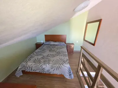 Cama o camas de una habitación en Cabañas El Marqués Zacatlán con Starlink
