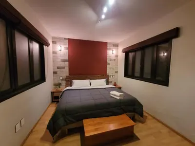 Cama o camas de una habitación en Casa B & L Céntrico Departamento