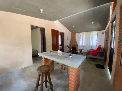 Zona de estar de Cabaña Abigel