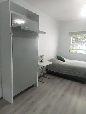 Cama o camas de una habitación en EL LOFT DE COYOACAN
