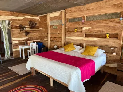 Cama o camas de una habitación en Cabañas Casa de Agua