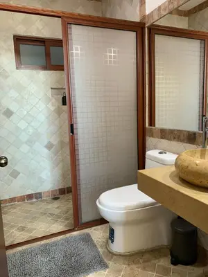 Un baño de CHOLULA SUITES