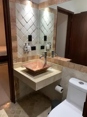 Un baño de CHOLULA SUITES