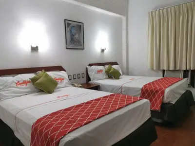 Cama o camas de una habitación en Hotel Candilejas Playa