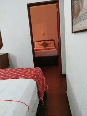 Cama o camas de una habitación en Hotel Candilejas Playa