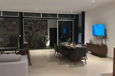 Una televisión o centro de entretenimiento en Residencia Corinto La Cima Frac Burgos Bugambilias