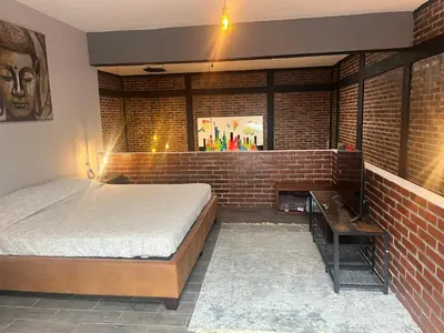 Cama o camas de una habitación en TRIBECA BEACH CASA BONITA