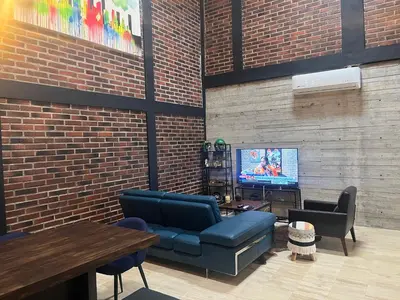 Una televisión o centro de entretenimiento en TRIBECA BEACH CASA BONITA