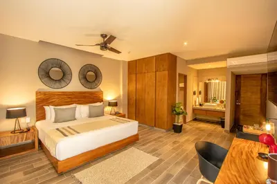 Cama o camas de una habitación en Nirú Ocean Suites by Binniguenda