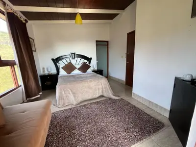 Cama o camas de una habitación en La Palapa & Posada Mía