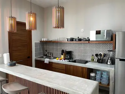 Una cocina o zona de cocina en Rooms Zicatela