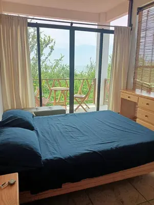 Cama o camas de una habitación en Casa Laud Chacahua Isla