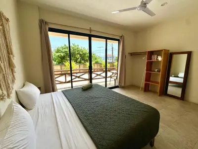 Cama o camas de una habitación en Casa Zianda - Departamentos en Puerto Escondido