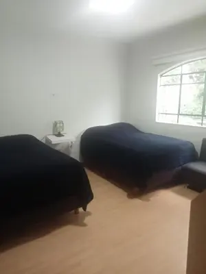 Cama o camas de una habitación en LA CASA DEL NARANJO