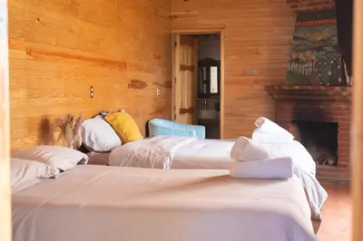 Cama o camas de una habitación en San José del Pacífico- Cabañas Camino al Cielo 3