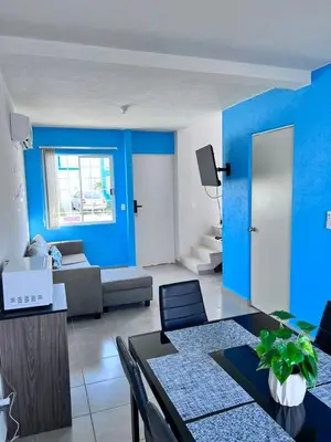 Una televisión o centro de entretenimiento en Casa en Acapulco diamante WIFI, Clima, Alberca