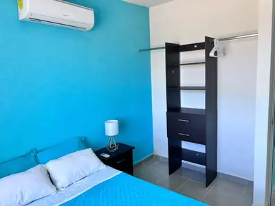 Cama o camas de una habitación en Casa en Acapulco diamante WIFI, Clima, Alberca