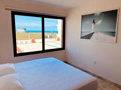 Cama o camas de una habitación en Dpto C-alberca Playa La Bamba - Facturamos